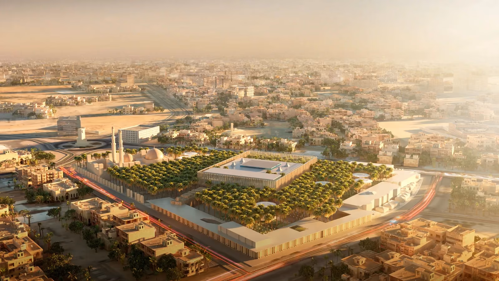 Aerial view of Dar Al Ulum Public Library by Nabil Gholam Architects, a palm-filled courtyard complex set within the dense urban fabric of Al Jouf, Saudi Arabia