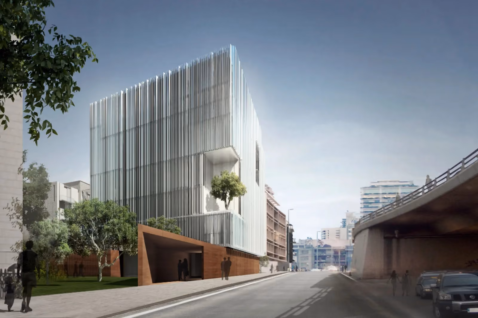 Saifi 178, a vertically fluted mixed-use building by Nabil Gholam Architects, standing beside an elevated roadway in Beirut, Lebanon, with a timber-clad entrance below