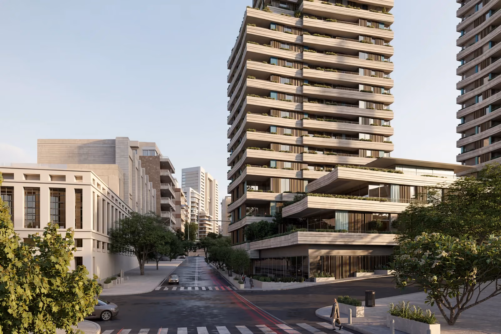 679, a residential high-rise by Nabil Gholam Architects in Beirut's Raouché district, Lebanon, tiered stone balconies with greenery rising above a tree-lined street