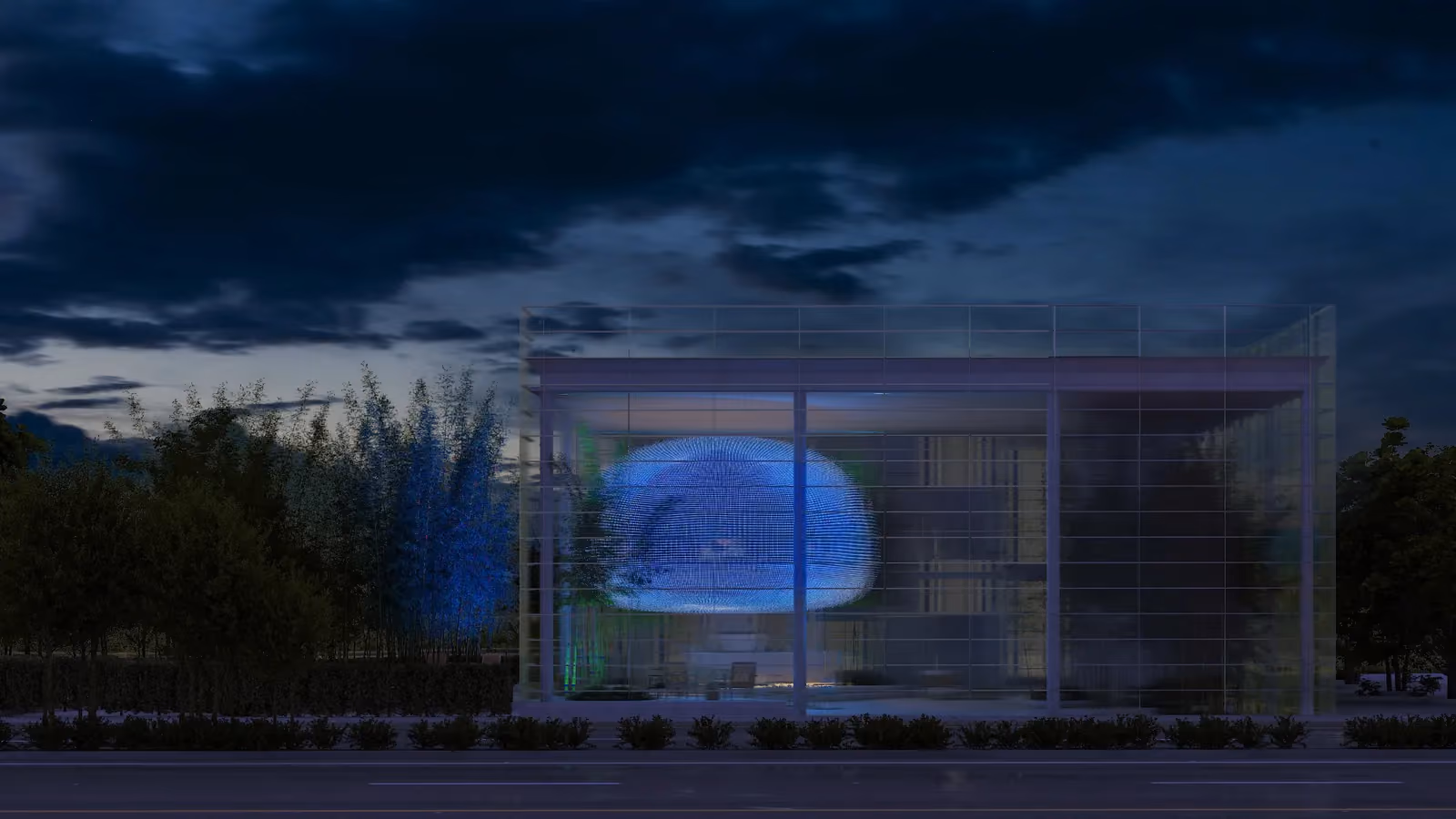 Art Hub, a glass mixed-use pavilion by Nabil Gholam Architects in Beirut, Lebanon, its illuminated cocoon-shaped display glowing blue at dusk amid bamboo landscaping
