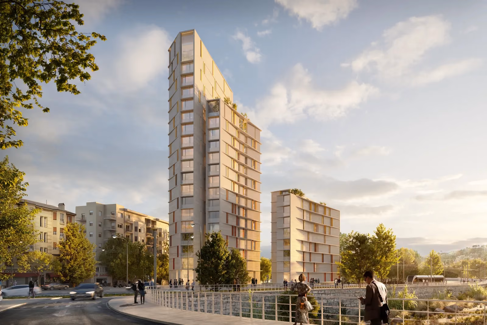 Tour de Nice, twin residential towers with perforated stone-toned facades by Nabil Gholam Architects, overlooking a riverside walkway in Nice, France