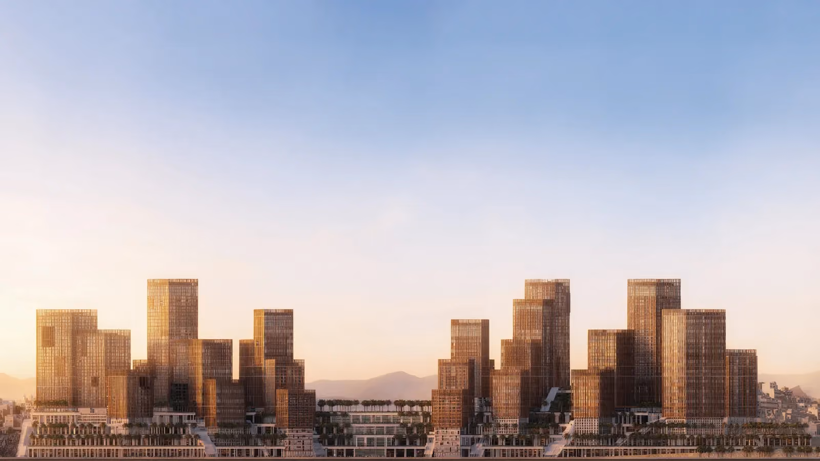 Jabal Omar, a mixed-use high-rise cluster by Nabil Gholam Architects, its warm perforated towers rising against hills at dusk in Mecca, Saudi Arabia