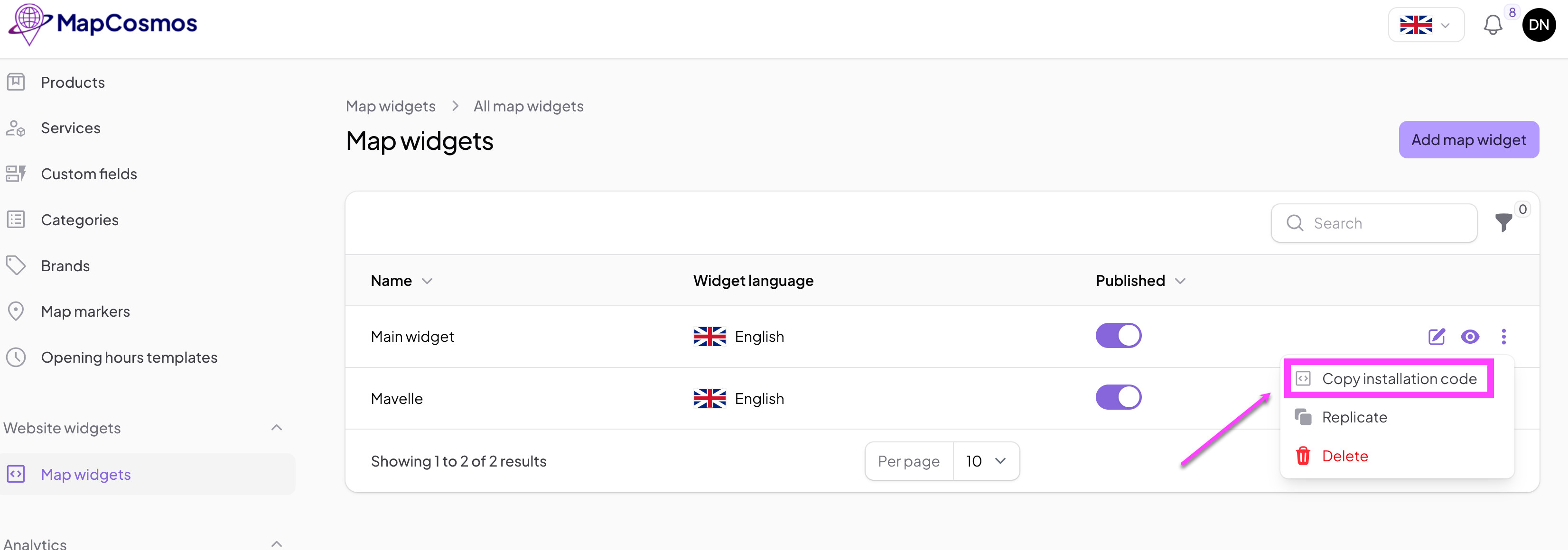 Screenshot of the MapCosmos store locator panel in Carrd, showing where to copy the installation code.