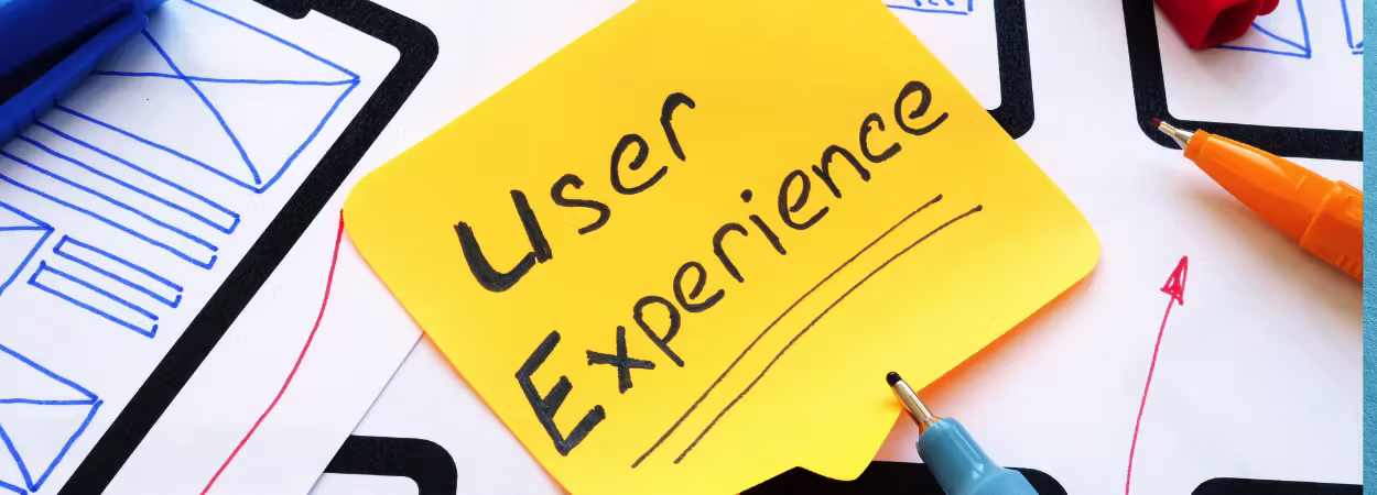 Piece of paper with “user experience” written on it, representing improved customer satisfaction using a PrestaShop store finder.