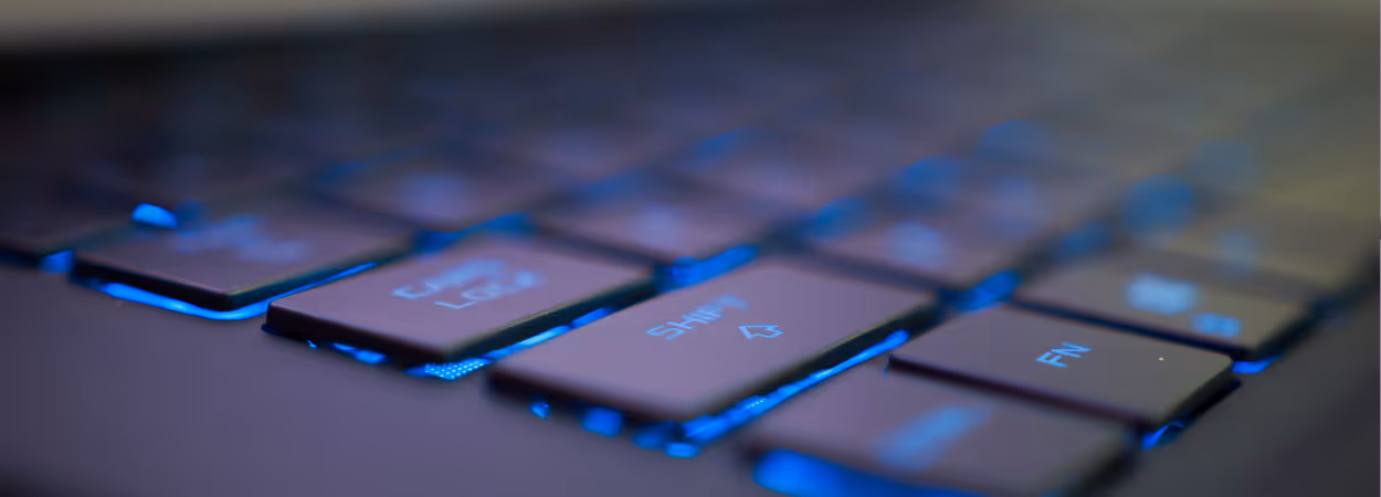 Keyboard with a computer screen showing map analytics dashboard, demonstrating governance and control.