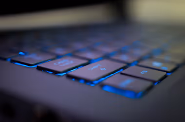 Close-up of a computer keyboard with an Enter key overlayed with a map icon, symbolizing map integration.
