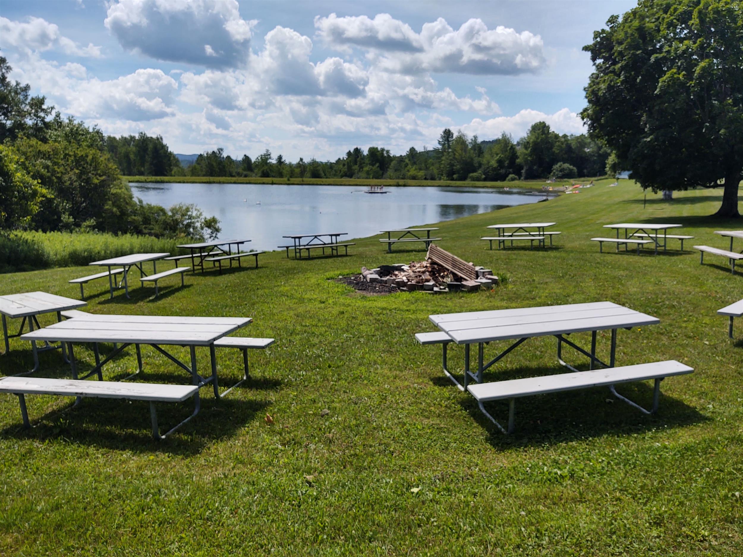 Campers enjoying the natural setting at Lake Champagne Campground