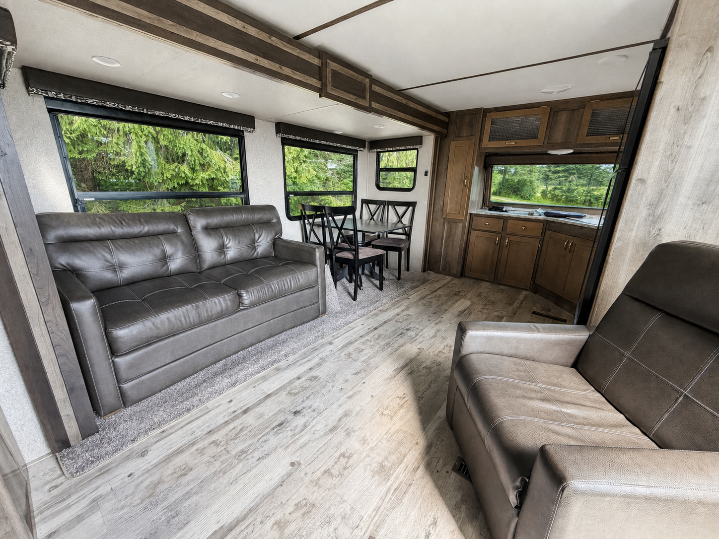 Living room inside the Lake Champagne rental camper