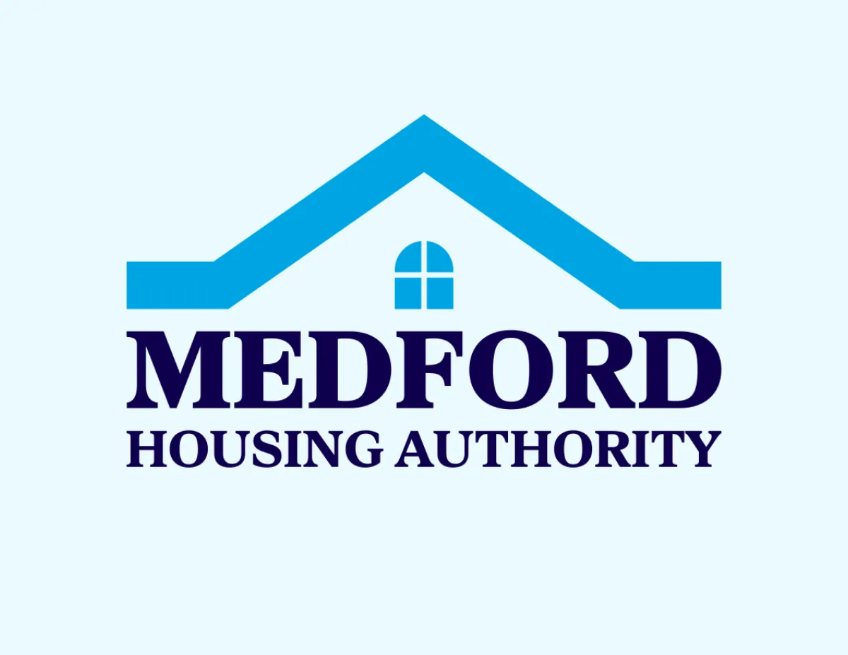 Logo of Medford Housing Authority with blue roof and window graphic above text.