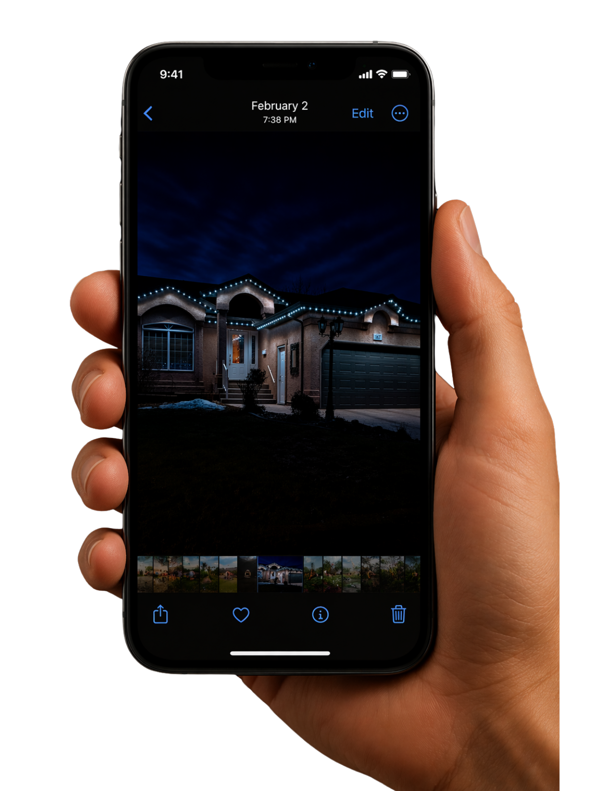 Hand holding phone with home lighting preview