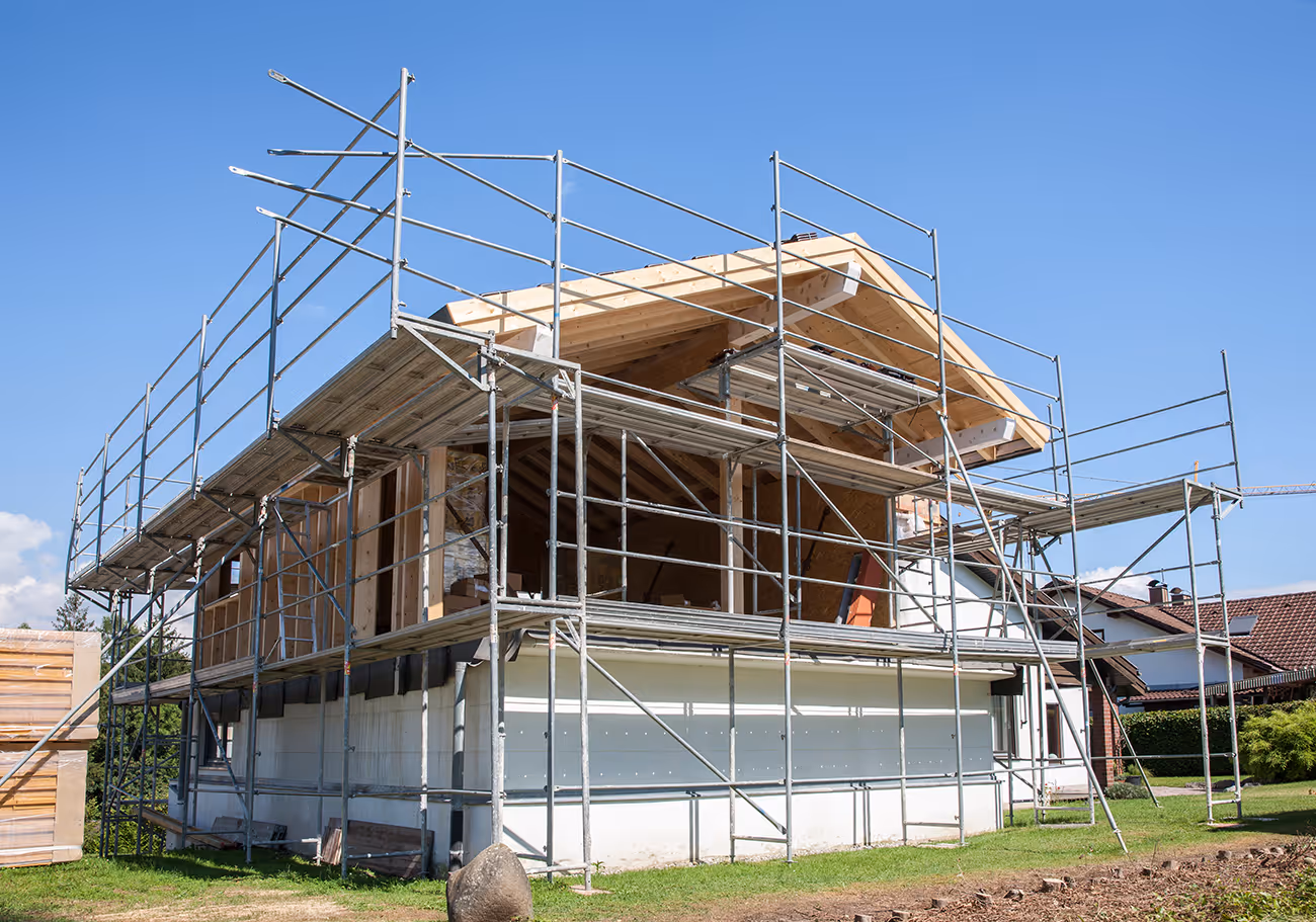 Foundation and structural framing during home extension build by Rippey Construction