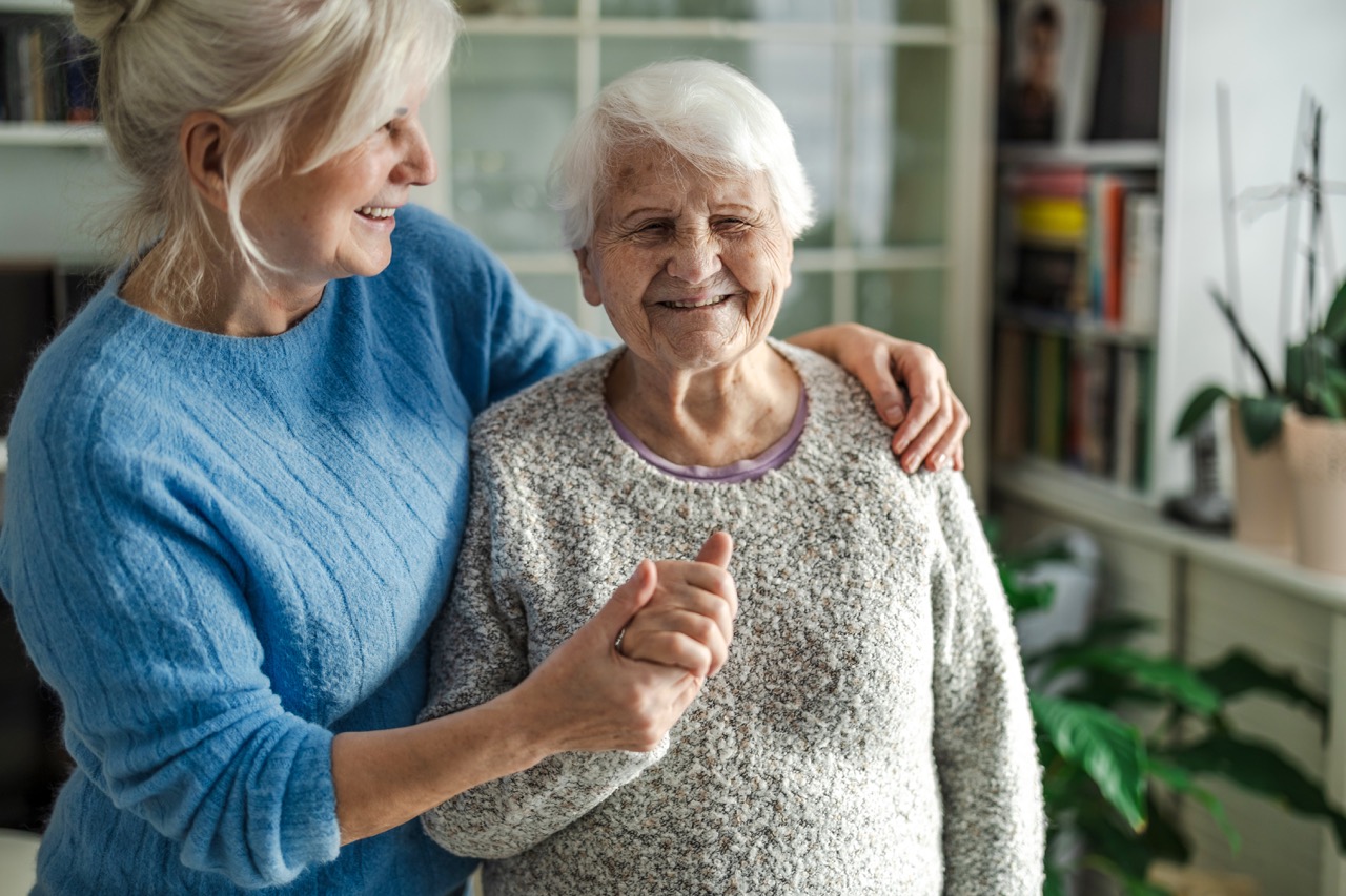 Family member supporting an older parent at home
