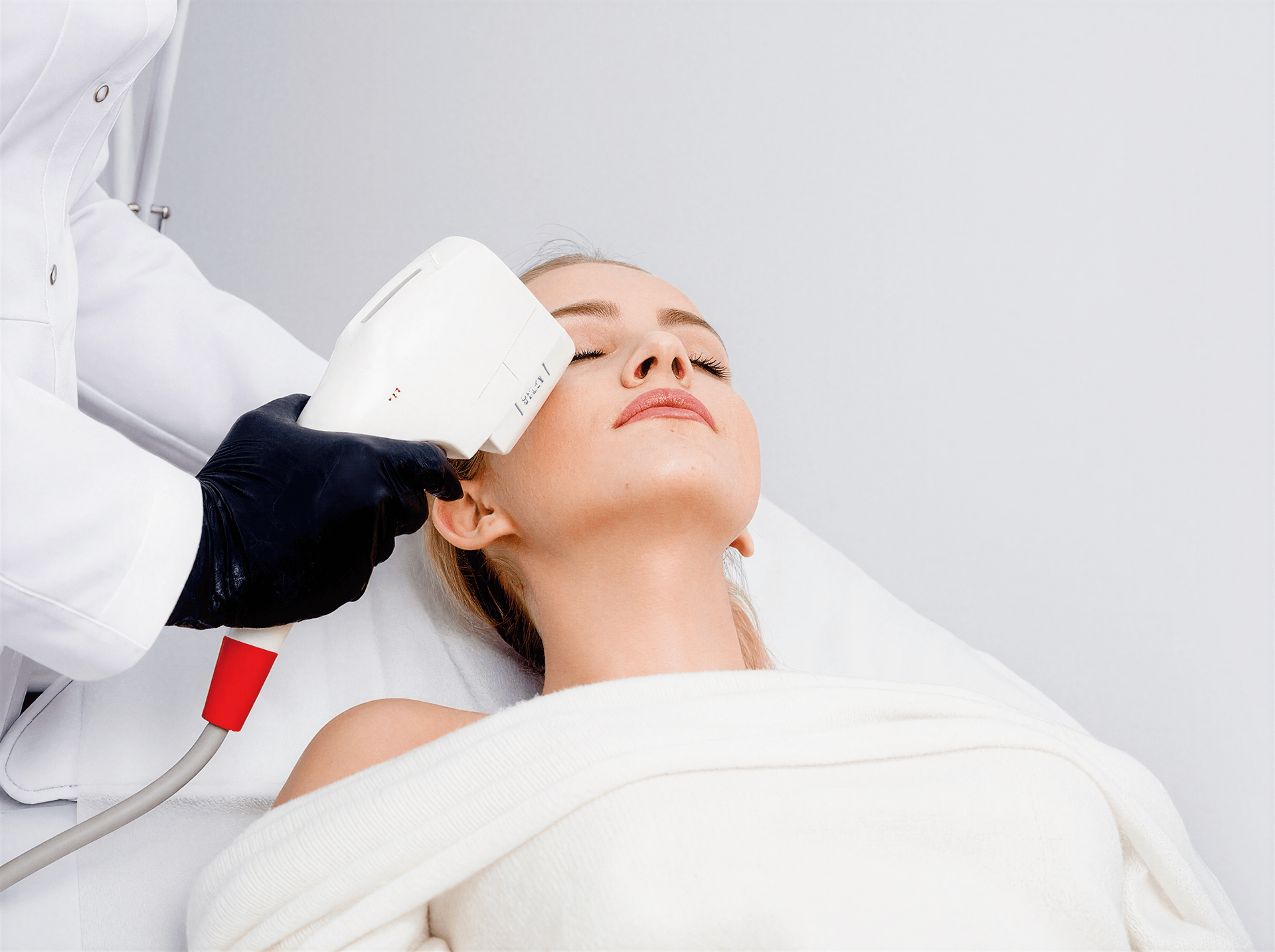 Woman receiving skin treatment