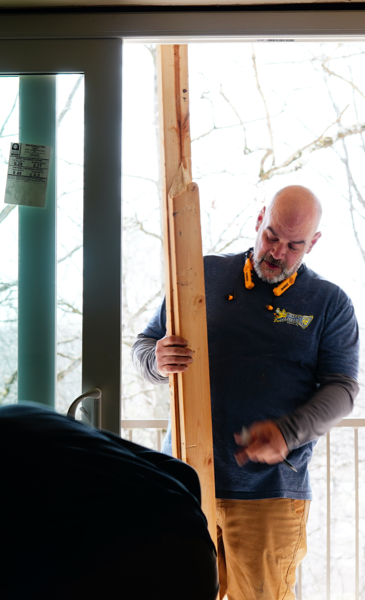 Completing a patio door replacement in State College, PA.