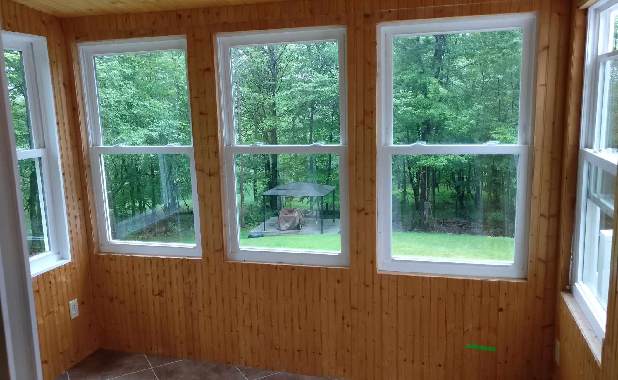 Installation of multiple slider windows in a State College, PA home.