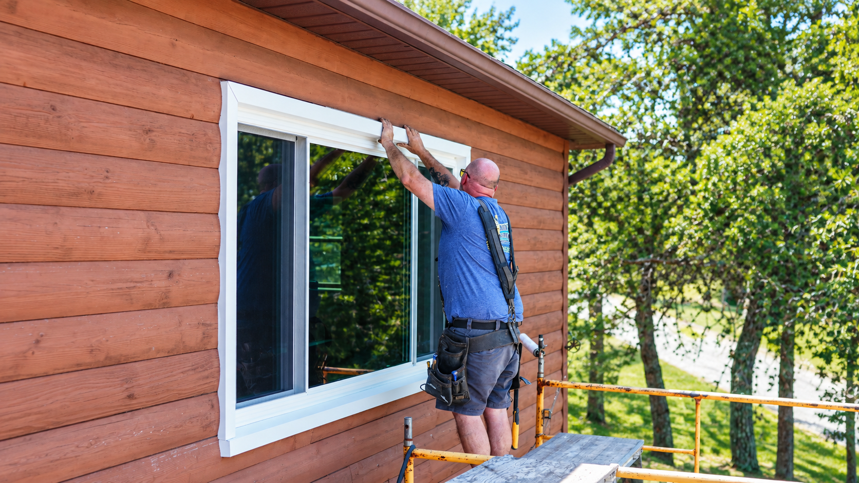 Window Perfections installer completing a replacement window installation