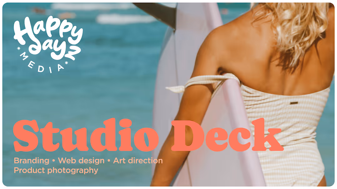 Blonde woman holding a surfboard near the ocean with text Studio Deck and media services listed.