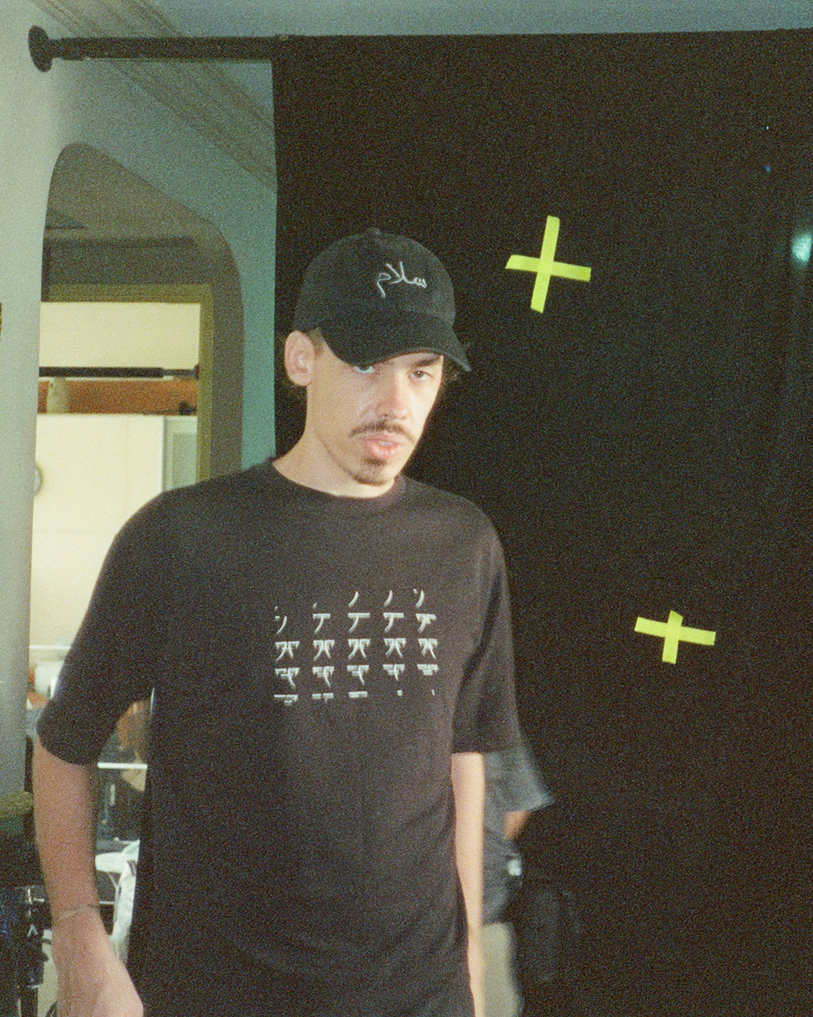 Photo of founding member, Tom Cattermole. Film photo taken on set.