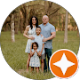 Family posing outdoors in wooded area, representing local Germantown TN business owners served by NET-i managed IT services