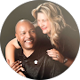 Two smiling professionals posing together, representing NET-i managed IT services team in Germantown TN