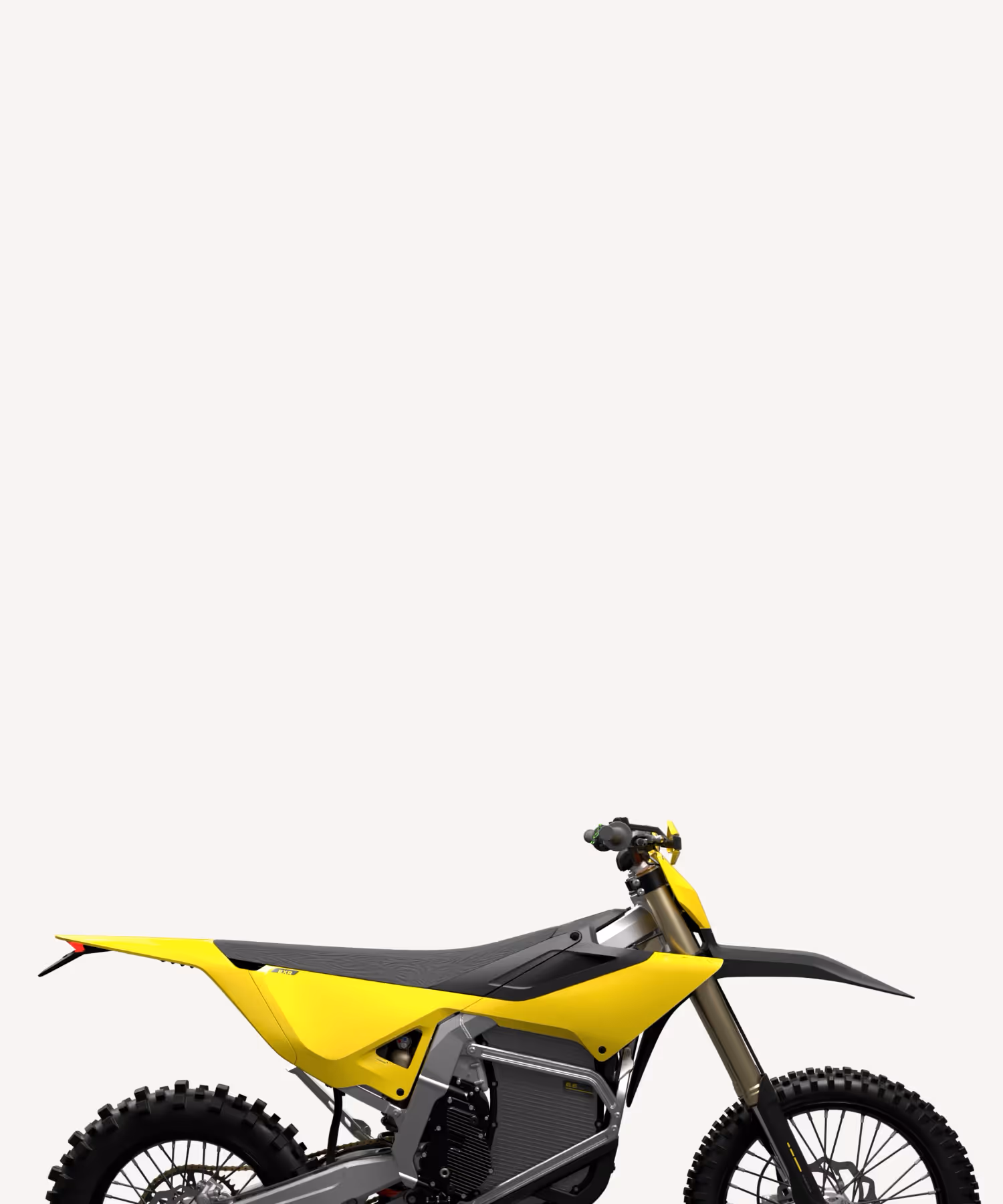 Yellow and black off-road dirt bike with knobby tires and visible suspension components.