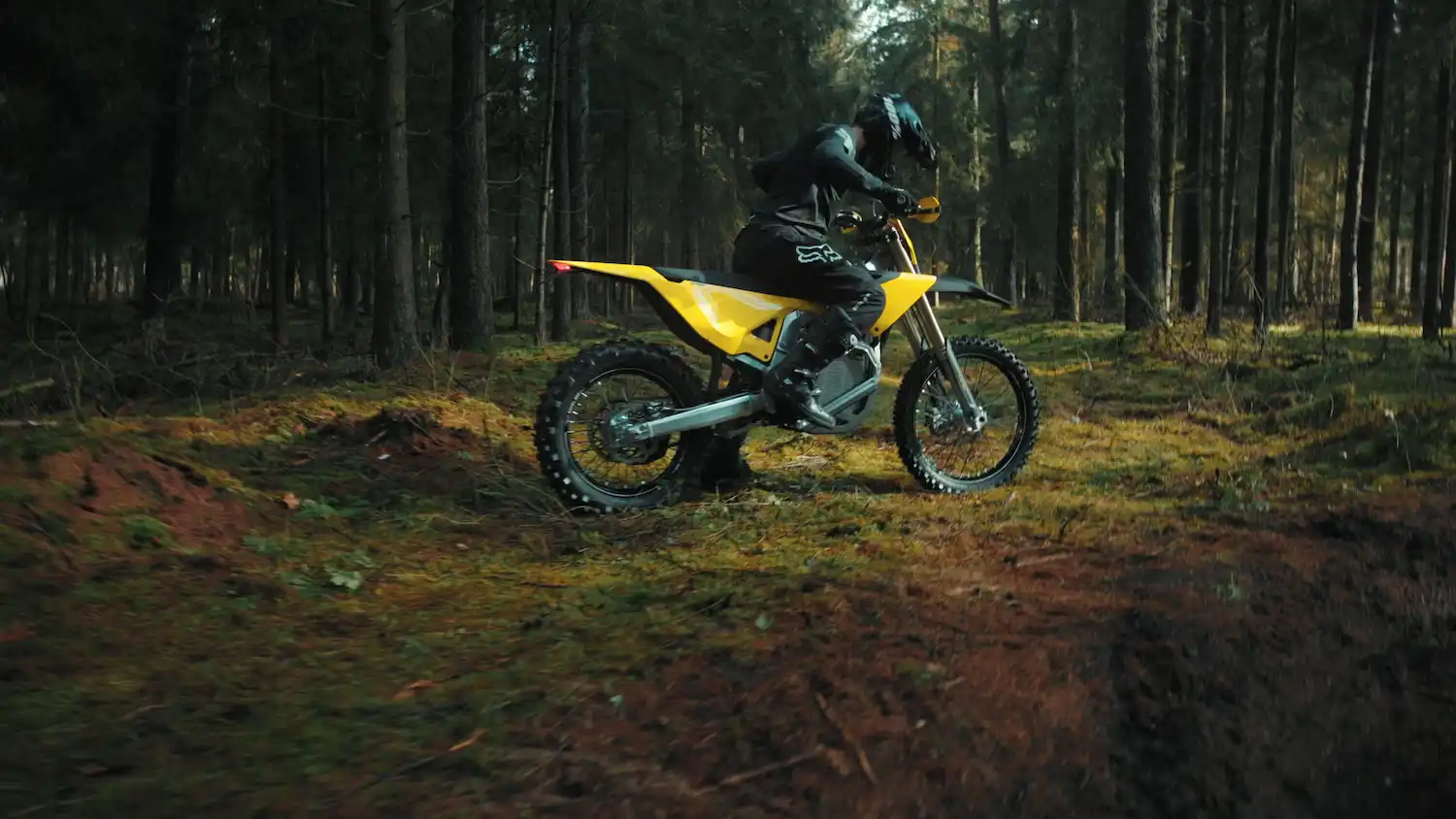 Electric yellow Enduro Bike in the forest
