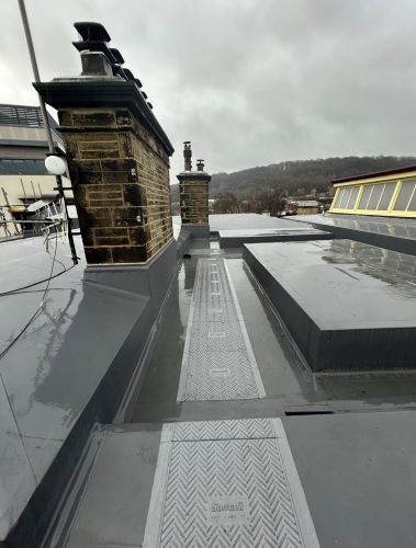 [background image] of rooftop with skyline (for a roofing contractor)