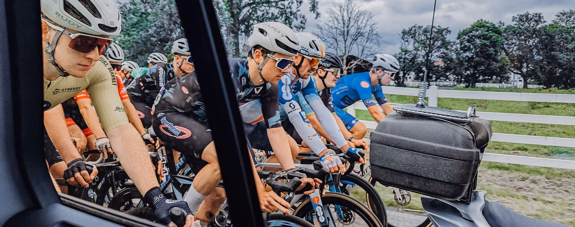 Cyclists riding closely in a race.