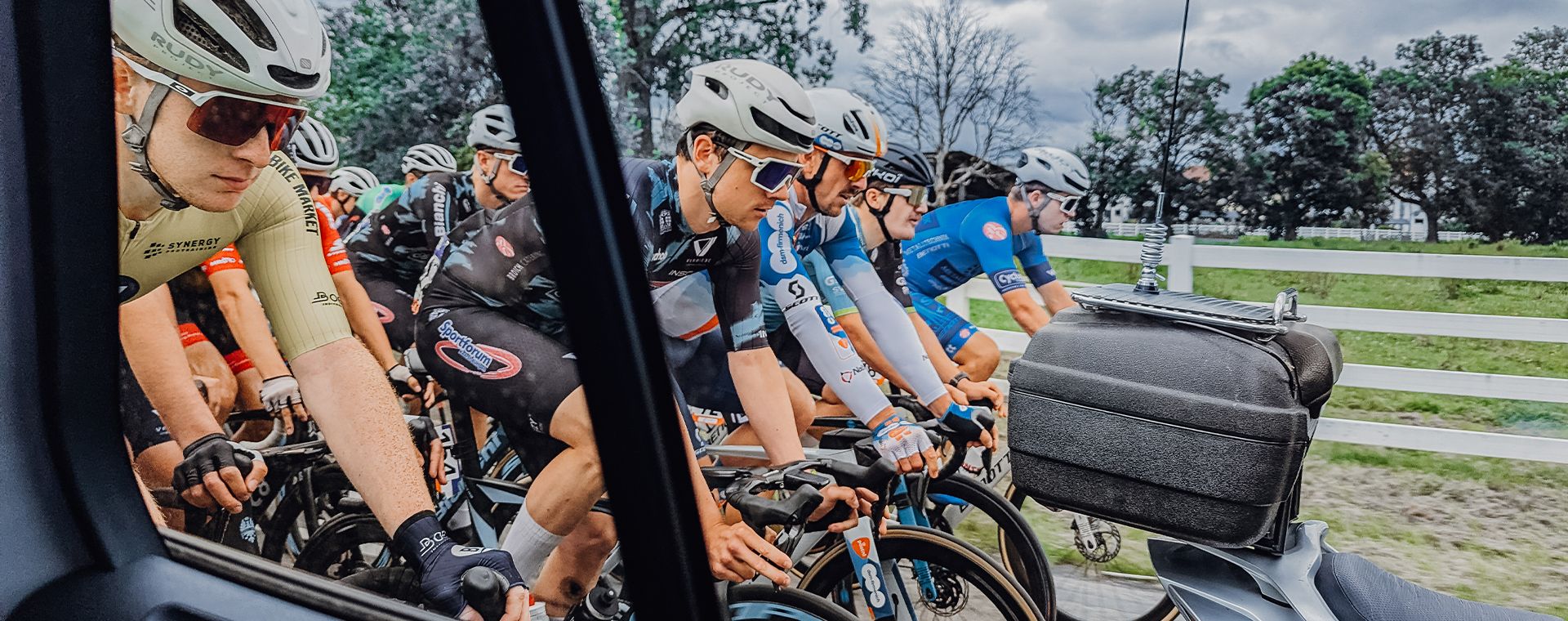 Cyclists riding closely in a race.