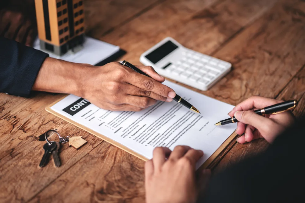 Signature d'un contrat de bail avec calcul du montant du dépôt de garantie pour une location