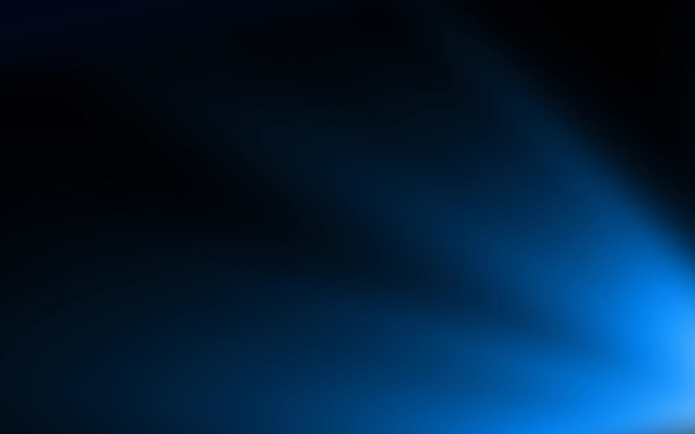 Abstract blue and black gradient shapes blending in smooth transitions.