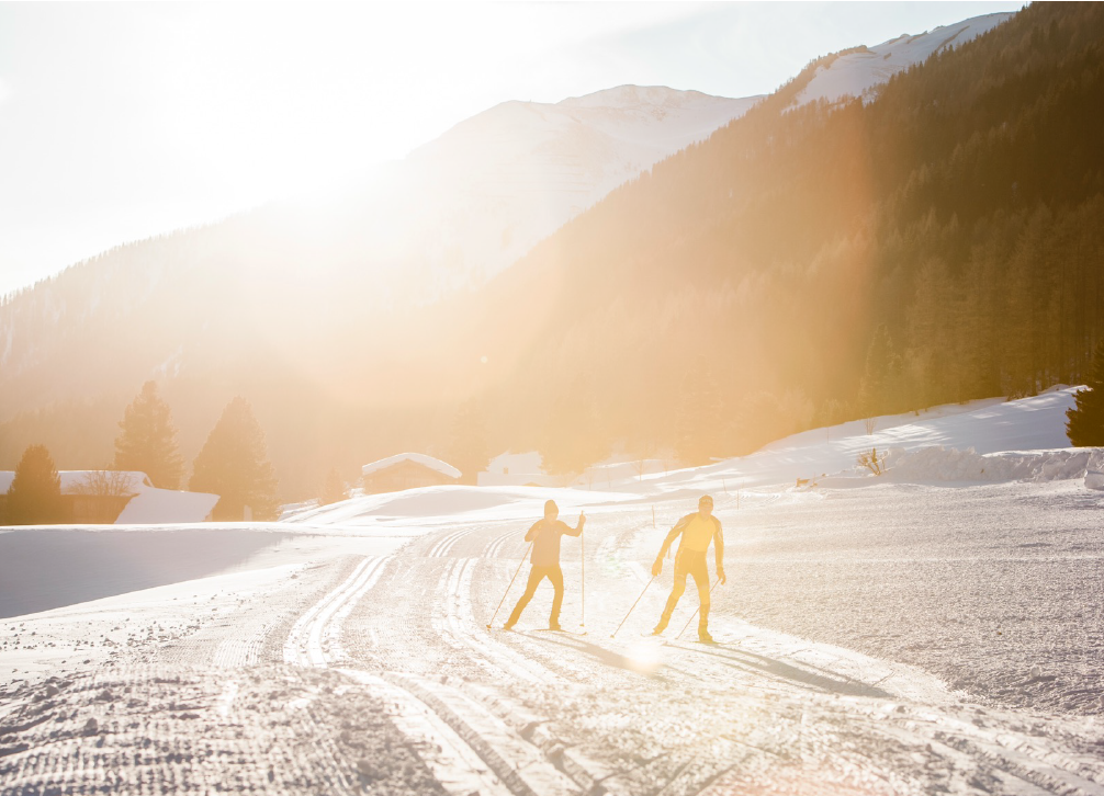 People skiing in the Ahrntal valley, South Tyrol