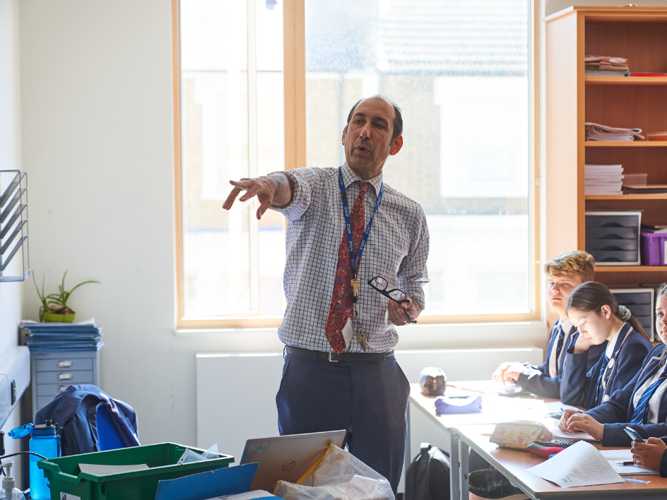 Now Teach website carousel image showing a teacher or career-changer in a school setting.