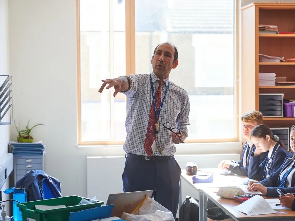 Now Teach website carousel image showing a teacher or career-changer in a school setting.