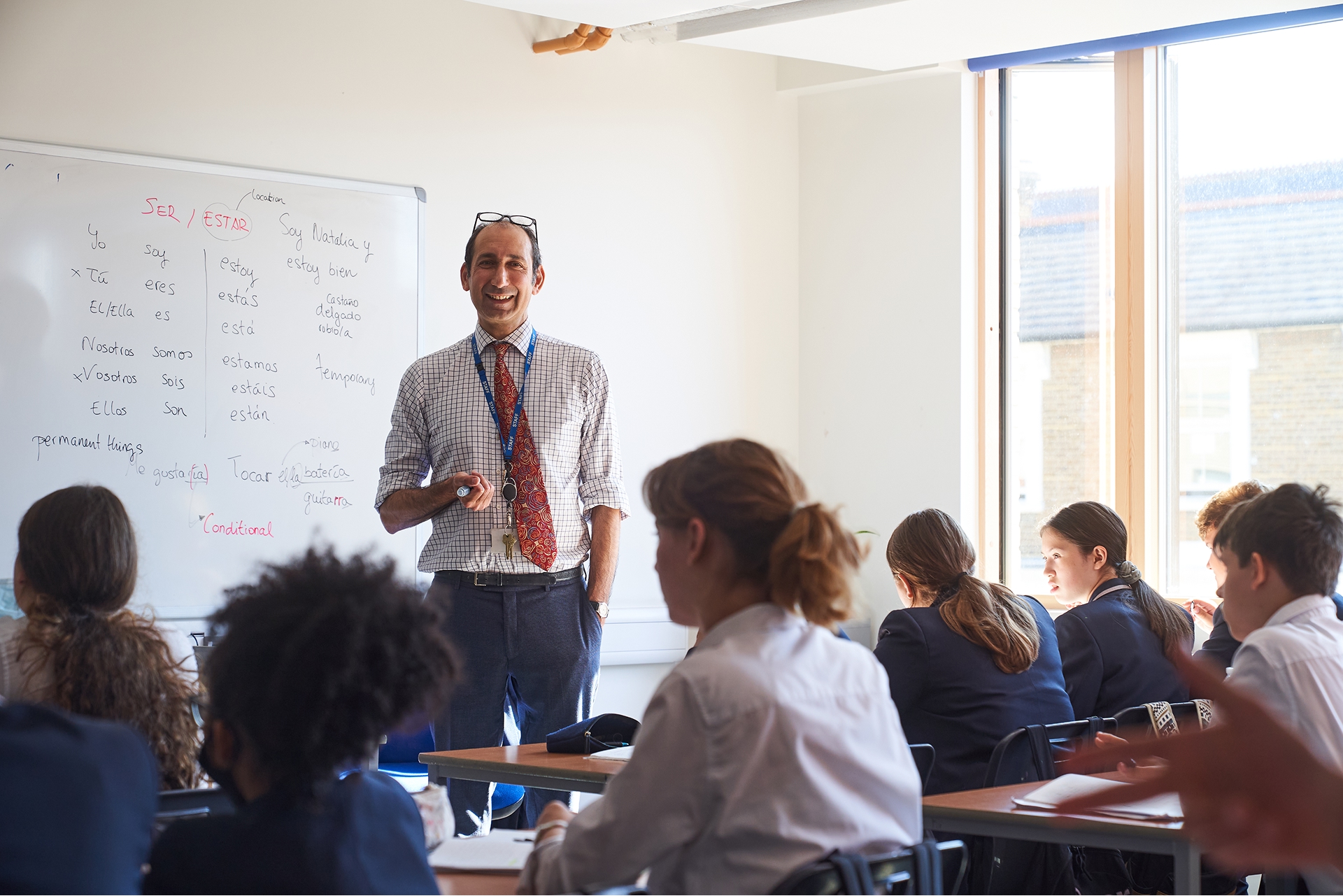 Jonathan Shaw, a Now Teach career-changer, photographed teaching in a school setting.