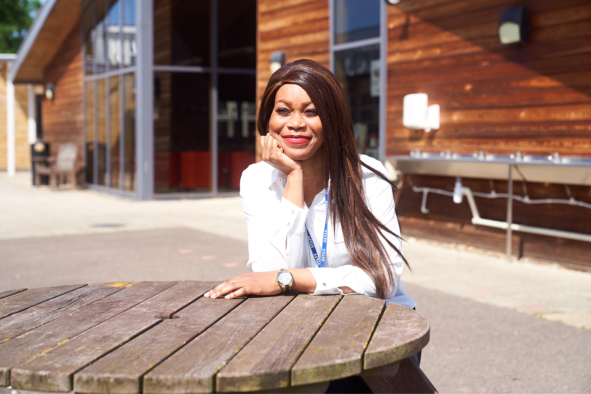 Edwige Nlassa, a Now Teach career-changer, photographed in a professional portrait setting.