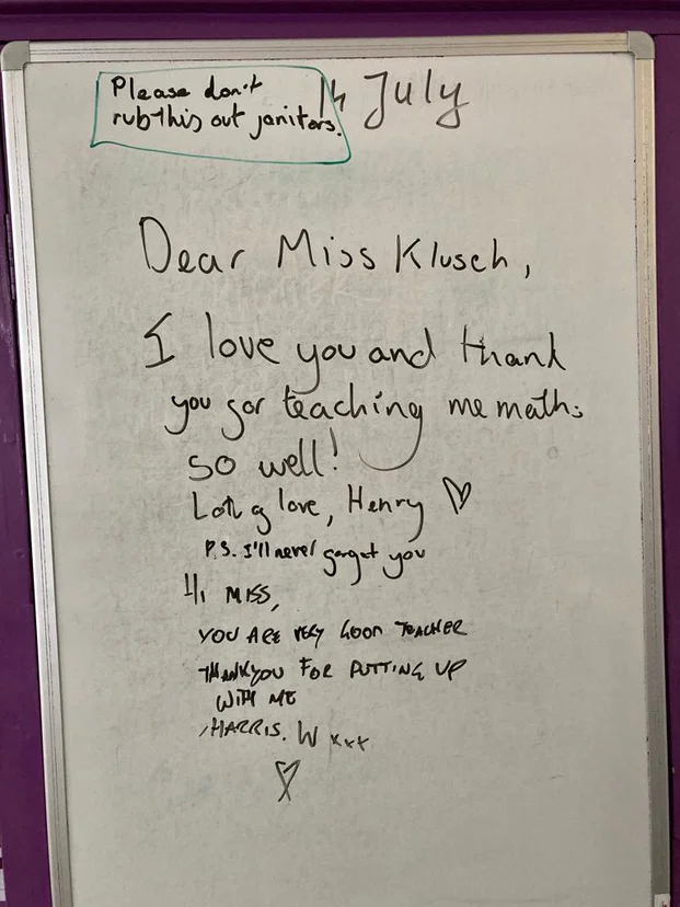 Whiteboard message from pupils to Miss Klusch: 'I love you and thank you for teaching me maths so well!'