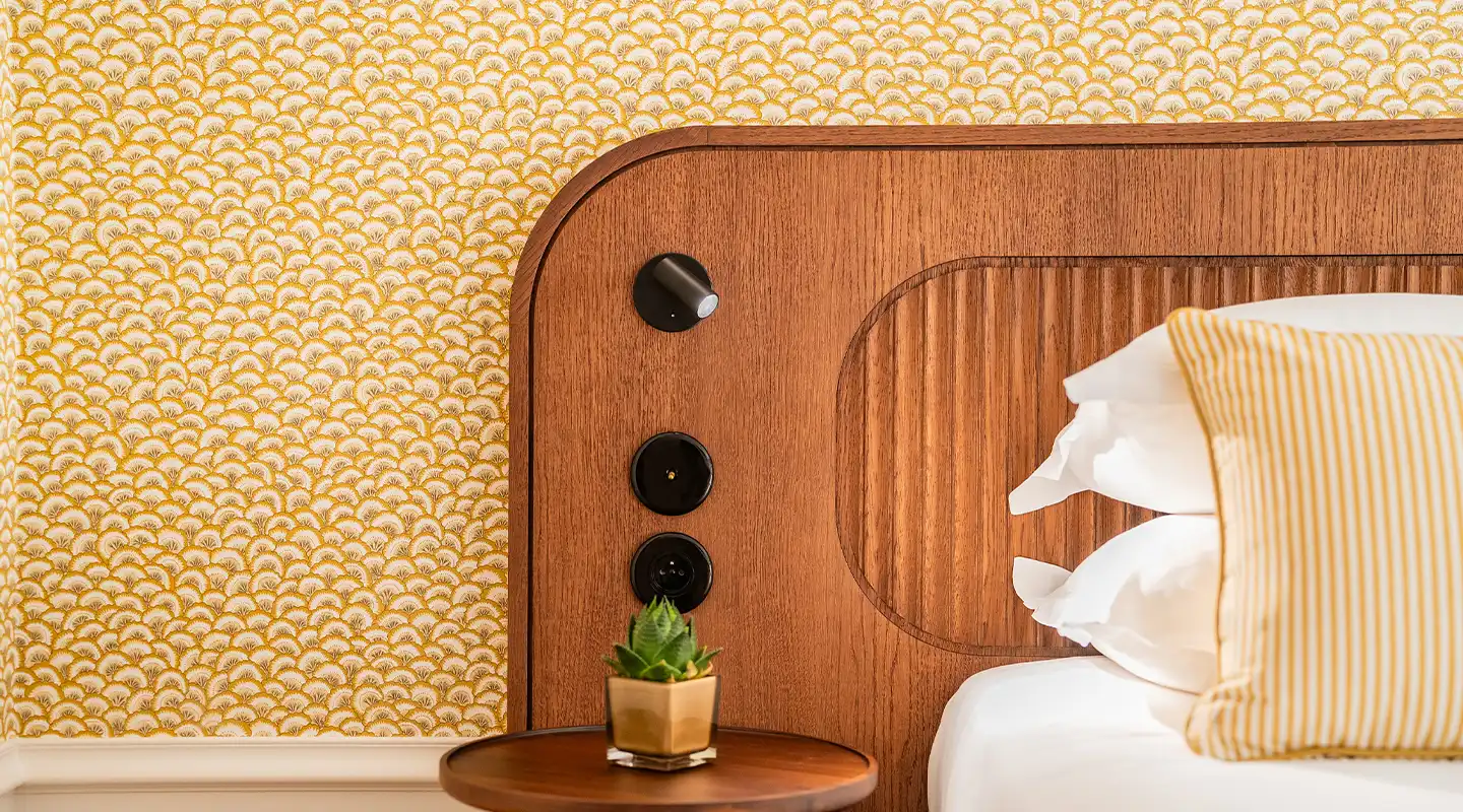 Comfortable room at Lepoussin Hotel, a 4-star hotel located in Cannes.