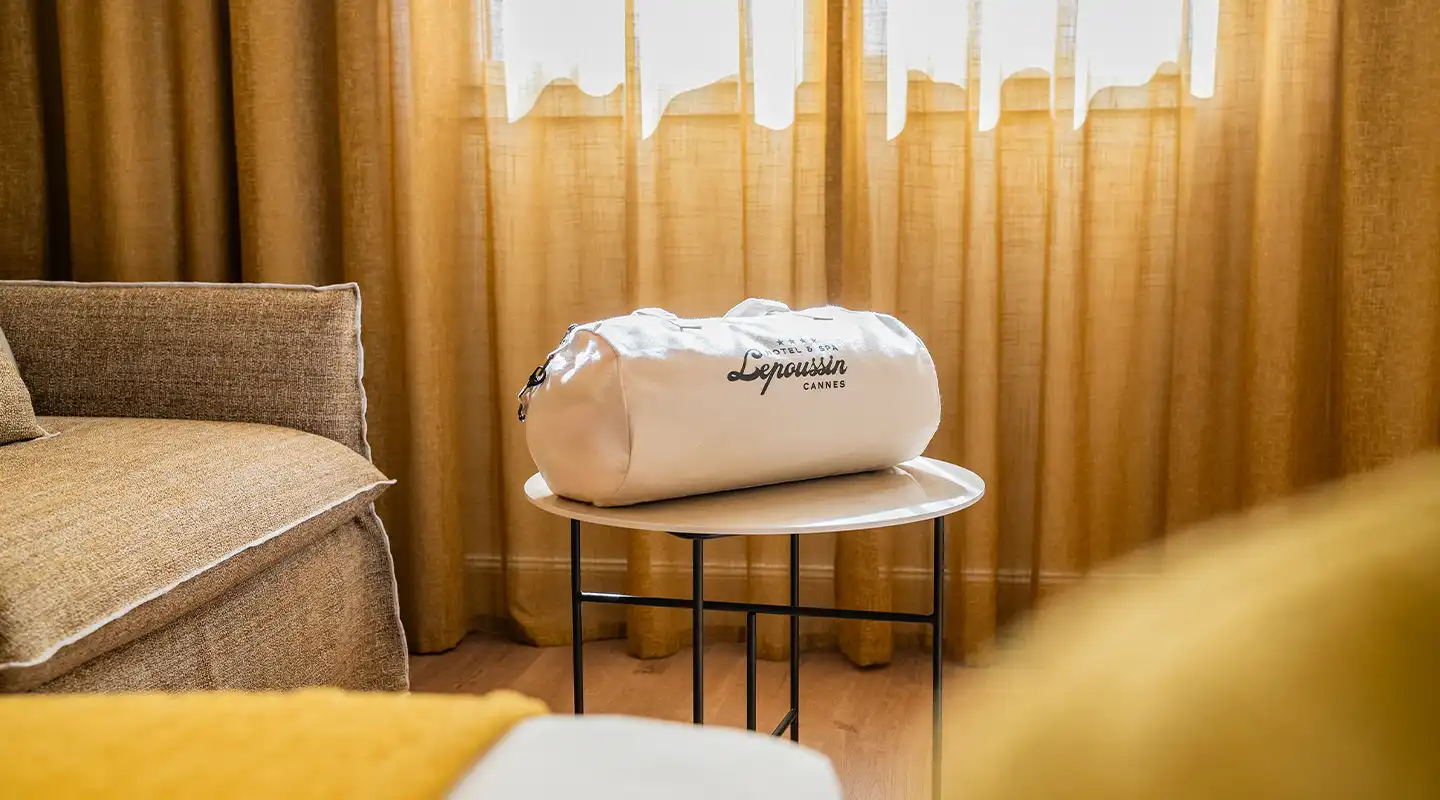 Elegant bag personalized with the logo of Lepoussin Hotel in Cannes.