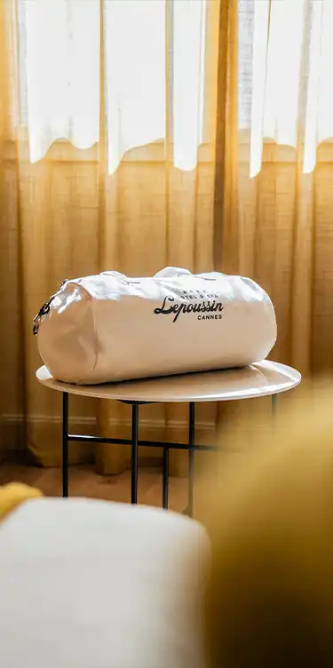 Elegant bag personalized with the logo of Lepoussin Hotel in Cannes.