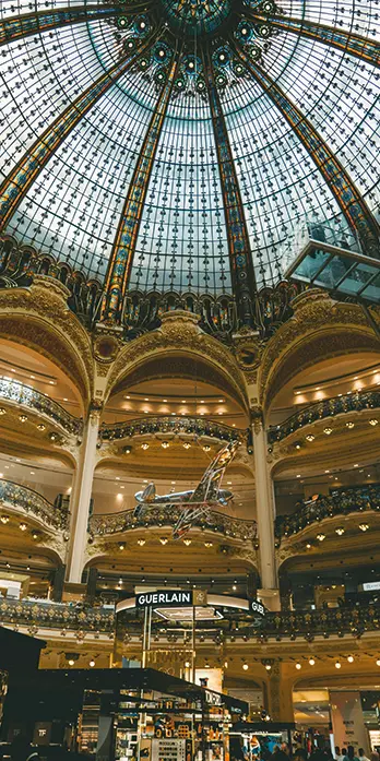 Interior of Printemps Haussmann with a stunning view of the glass Dôme