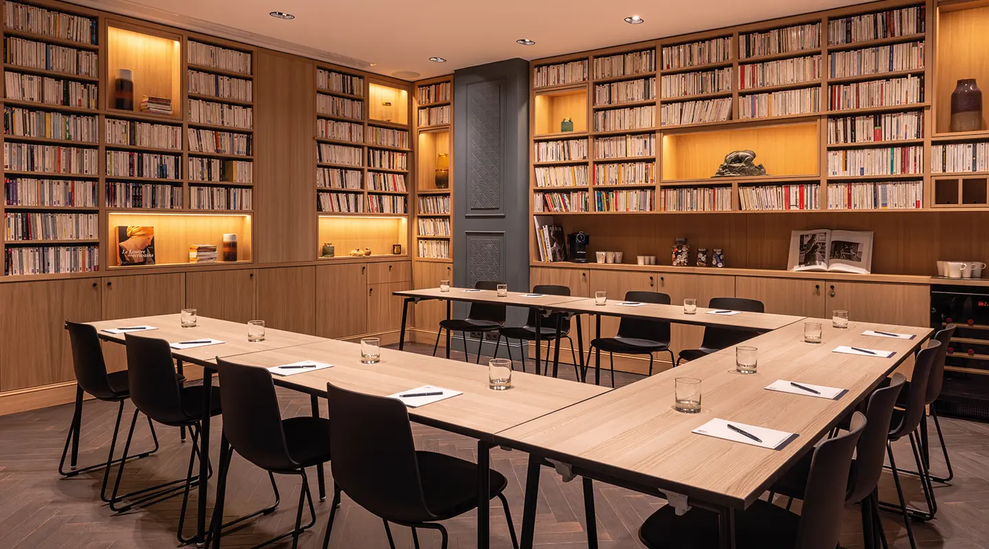 Contemporary meeting room setup at the Square Louvois hotel in Paris