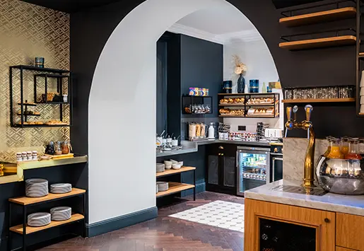 View of the breakfast room and buffet of the Square Louvois hotel in Paris