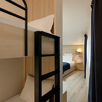 Appartement 2 pièces supérieure lit superposé