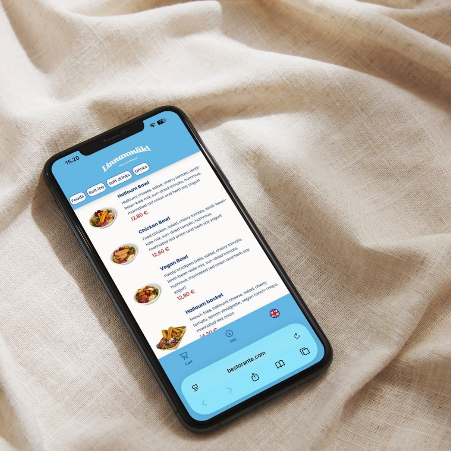 Smartphone on beige fabric showing a restaurant menu with dishes and prices in euros.