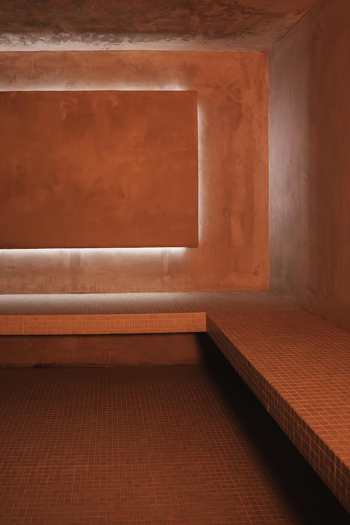 Cabine de soin luxueuse et épurée au Spa MyBlend, ambiance sereine dédiée à la beauté et au bien-être.