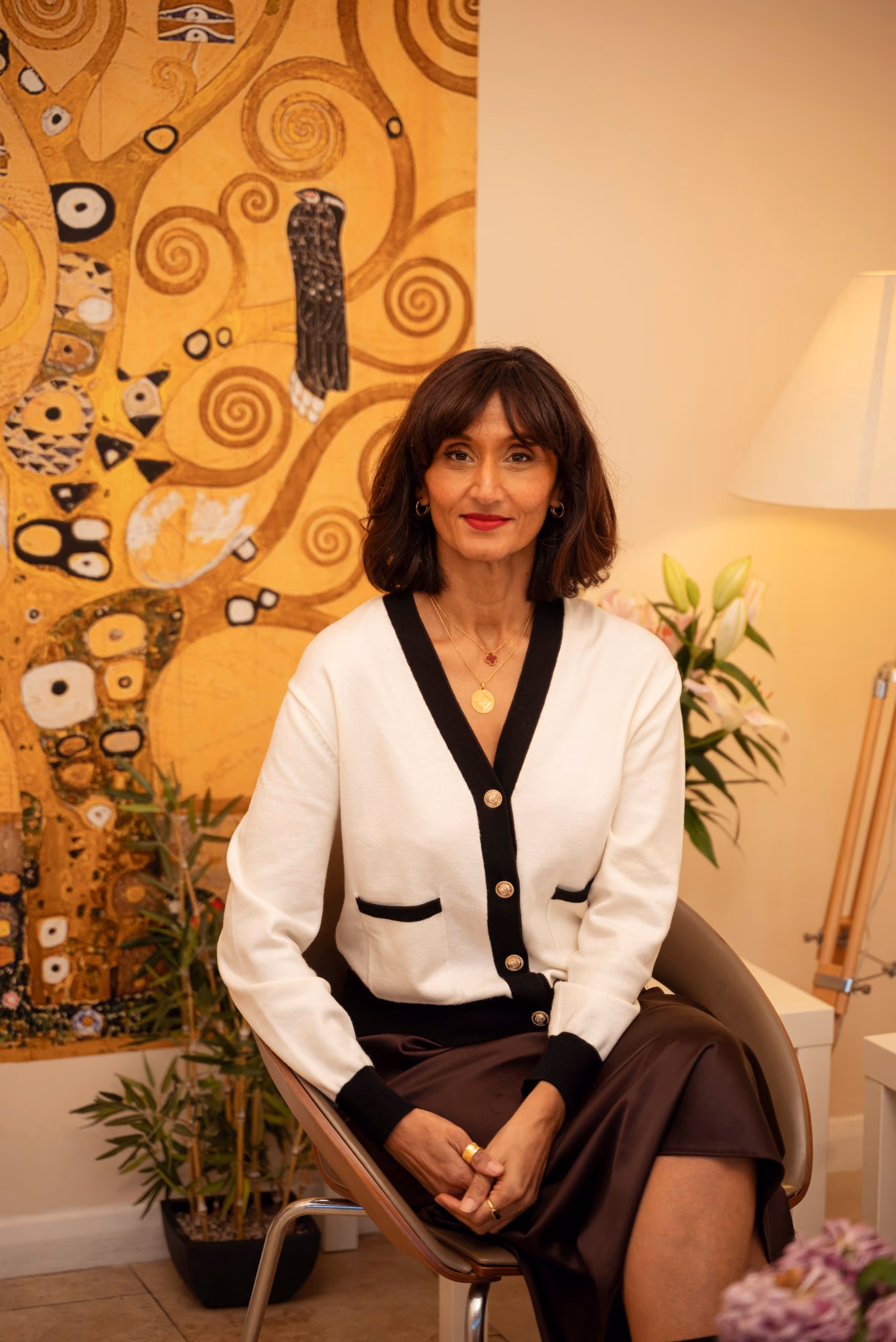Binta Patel, life and relationship coach, seated in the lounge at Dental & Wellness London