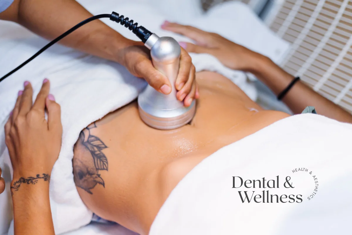 Therapist using a body-contouring device on a woman's abdomen — body sculpting safety