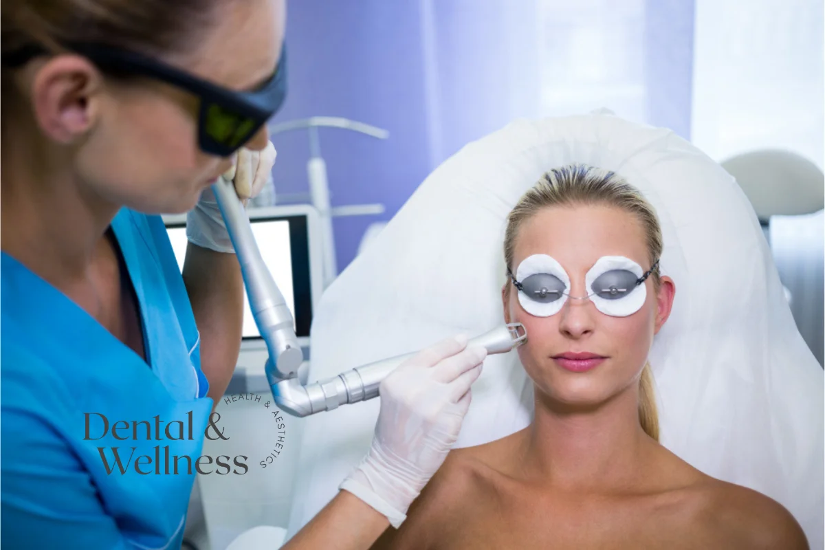 Dark circles under the eyes: patient in protective eye shields having a laser skin treatment