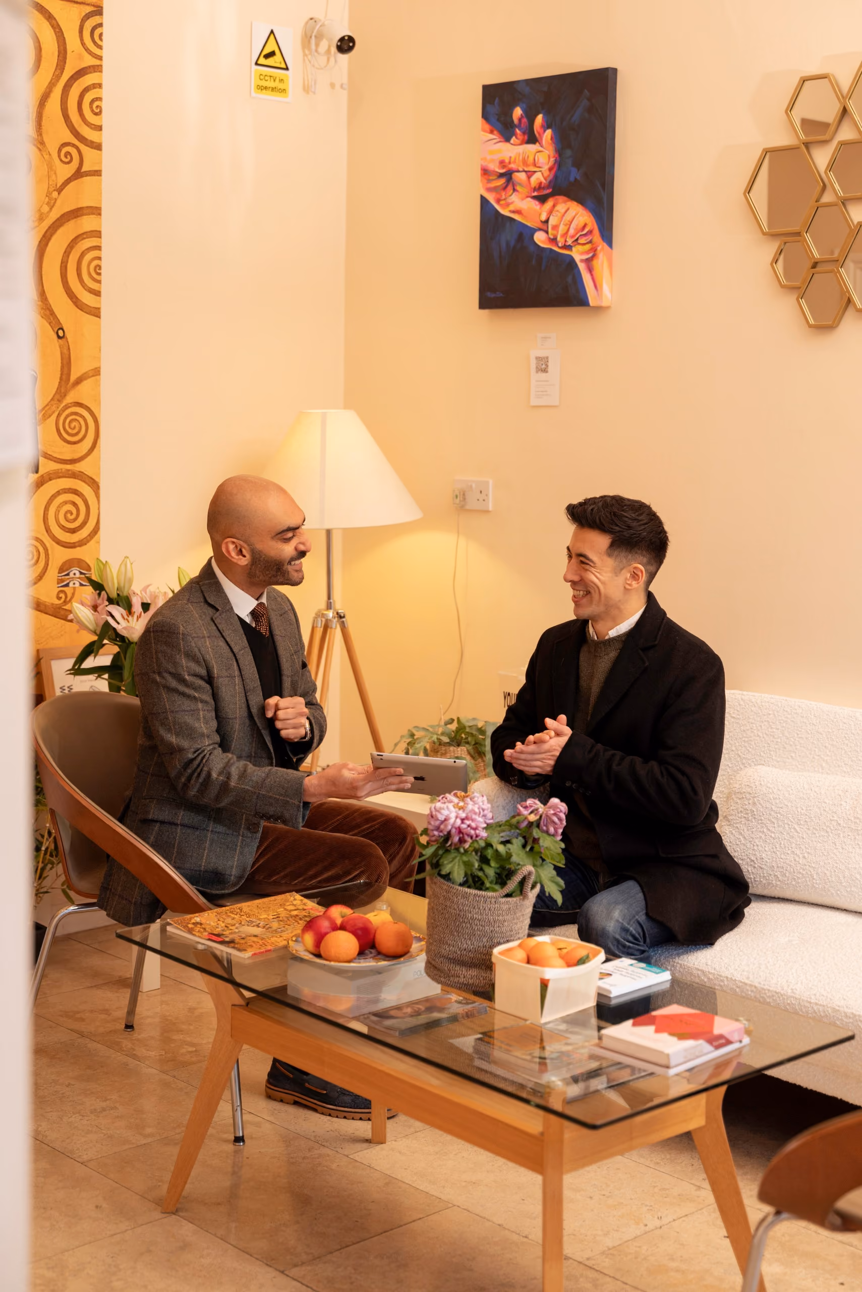 Invisalign cost in Islington: treatment and cost conversation in the patient lounge at Dental & Wellness London